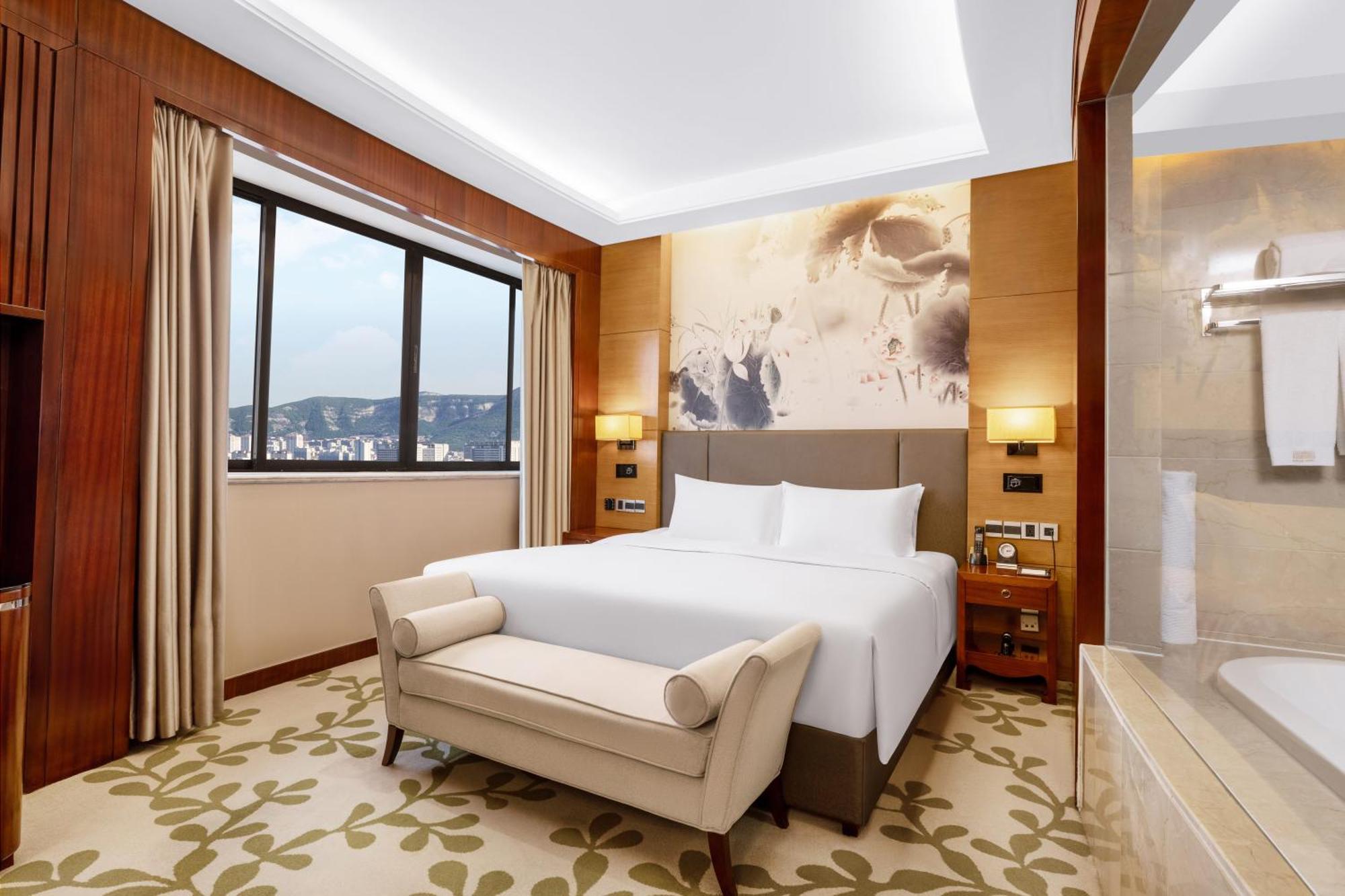 Enlux Hotel Jinan Extérieur photo