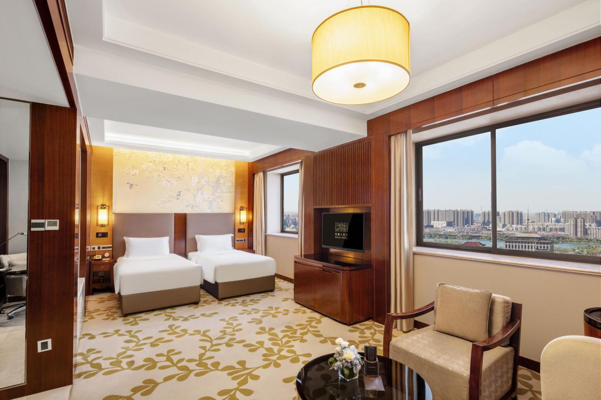 Enlux Hotel Jinan Extérieur photo